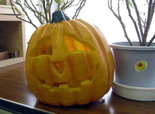 A jack-o-lantern on the table